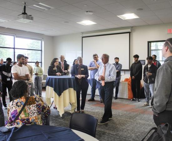 President Todd Pfannestiel and Provost Stephanie Nesbitt welcome incoming International students to Utica University.