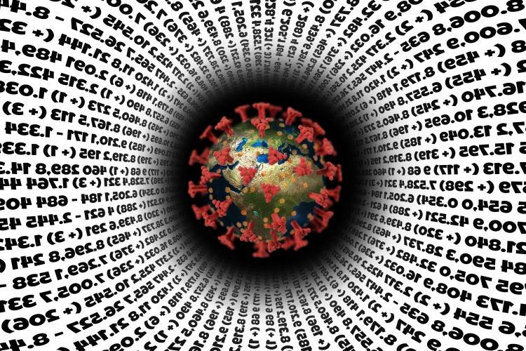 COVID spike protein surrounded by data and numbers.